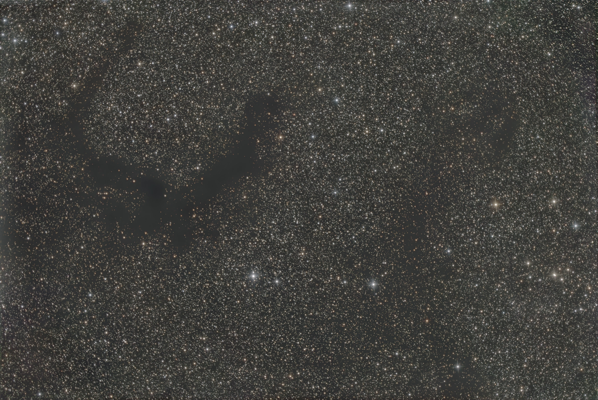 Barnard's E Nebula B 142 and B143 is a pair of dark clouds in the constellation Aquila.